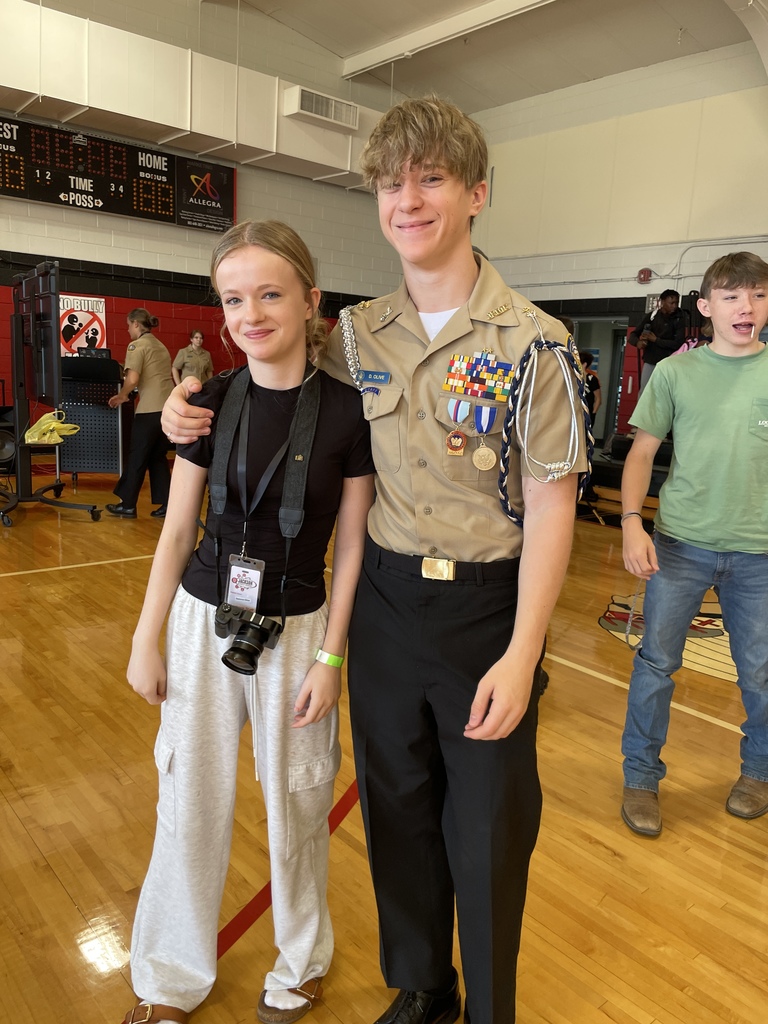 The Olive siblings posing after NJROTC presentation.