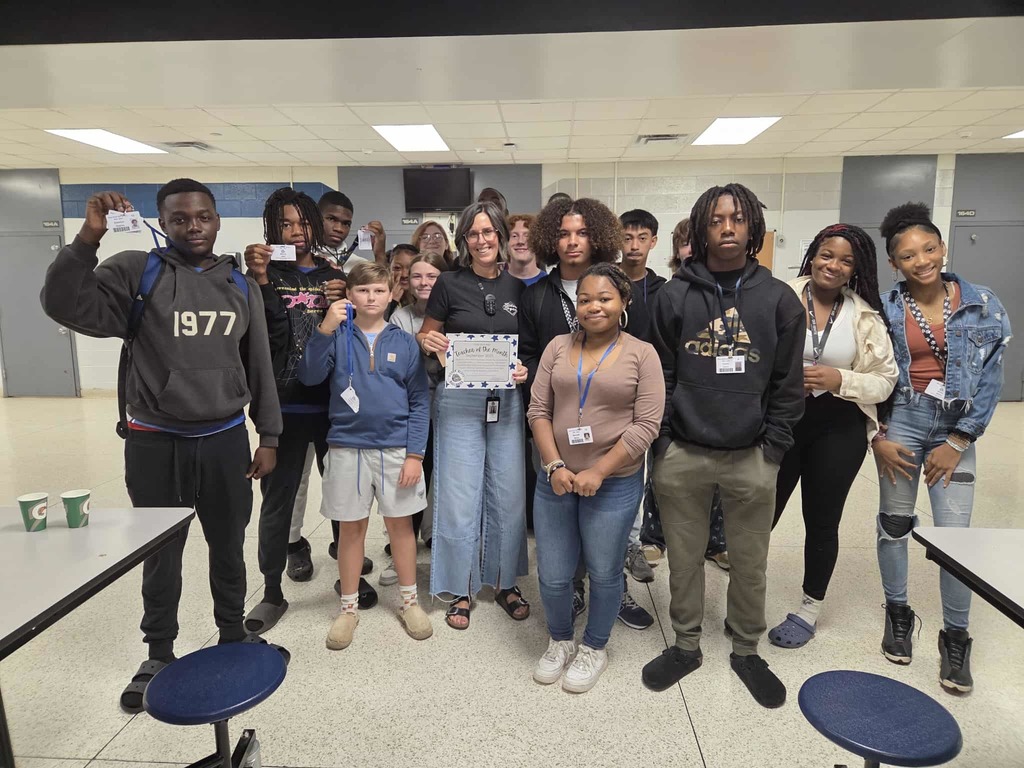 Teacher of the Month, Mrs. Mack with her students