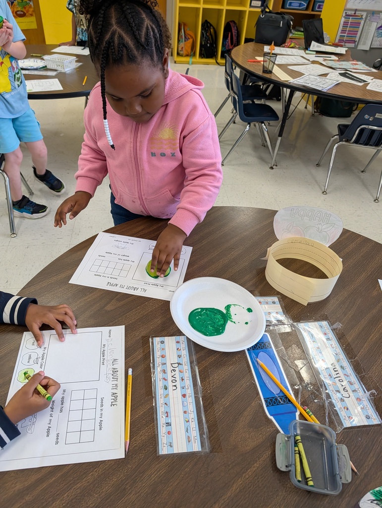 Students learning about apples.