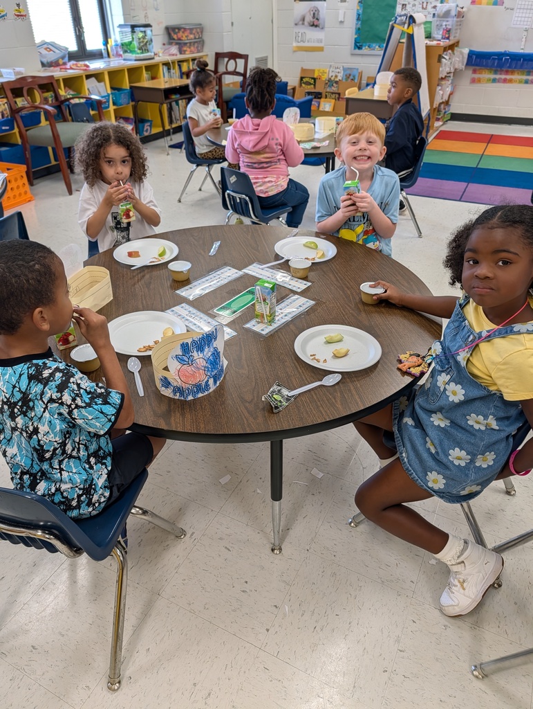 Students learning about apples.