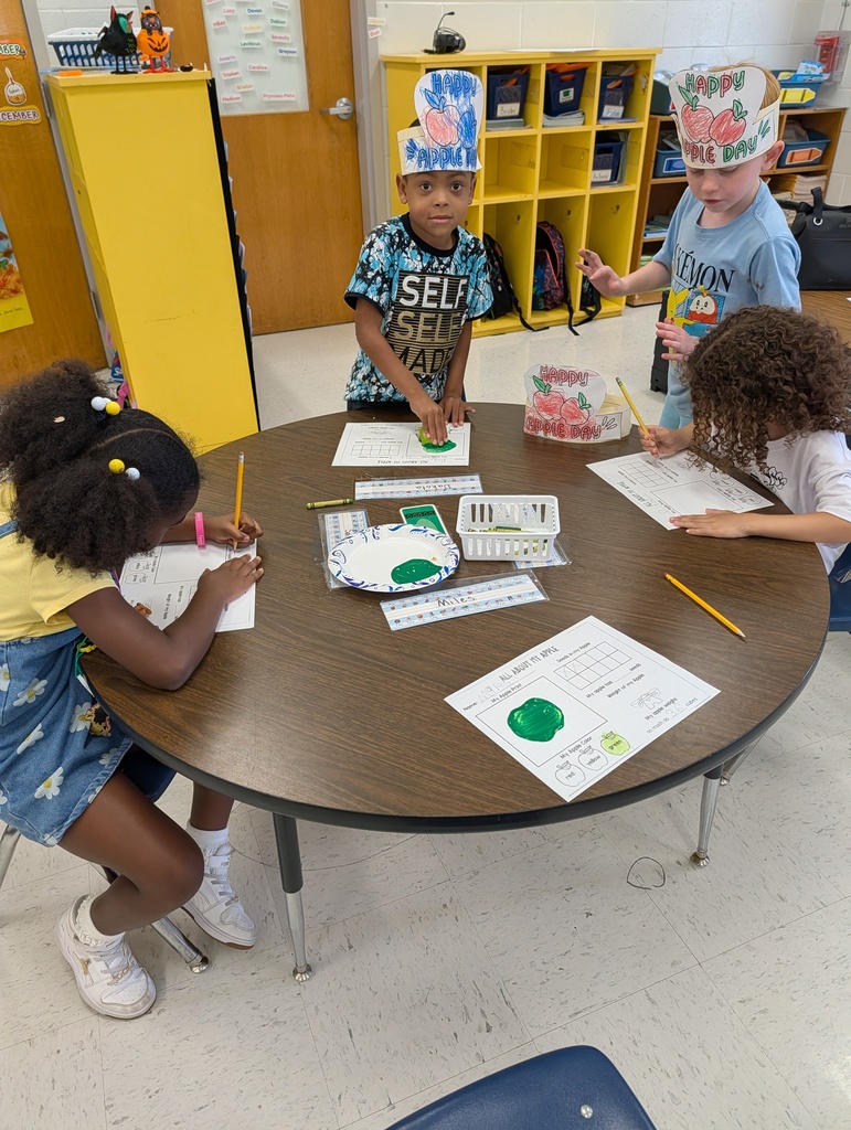Students learning about apples.