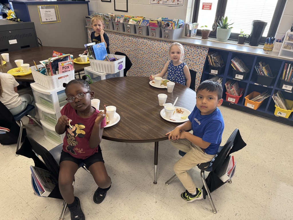 Students learning about apples.