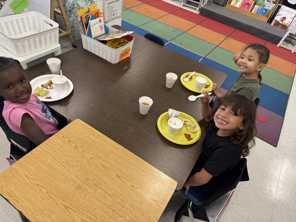 Students learning about apples.
