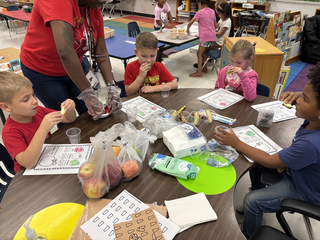 Students learning about apples.