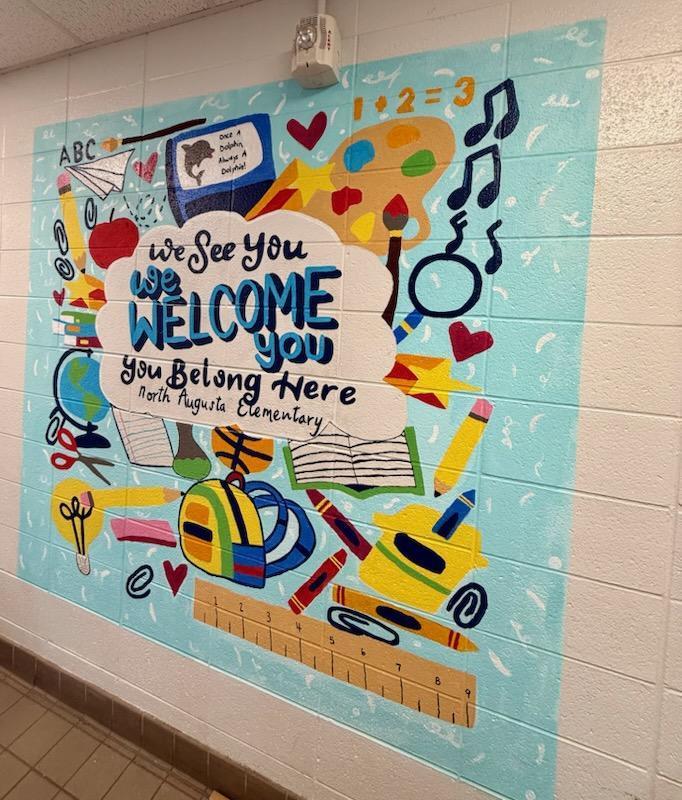 New Front Mural “We See You. We Welcome You. You Belong Here. North Augusta Elementary.” It also proudly features our reminder: “Once a Dolphin, Always a Dolphin!”