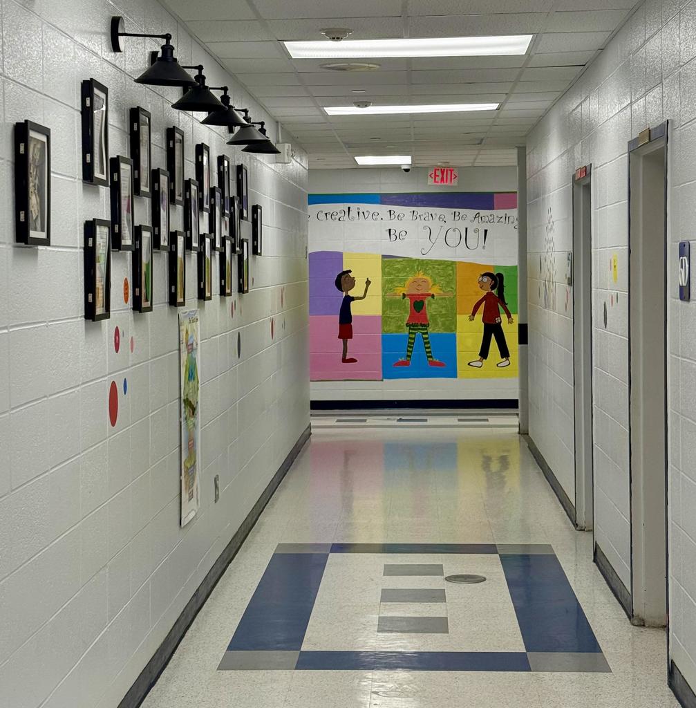 New back hallway mural “Be Creative. Be Brave. Be Amazing. Be You!” Three students are pictured shining with confidence, encouraging all of us to embrace who we are.
