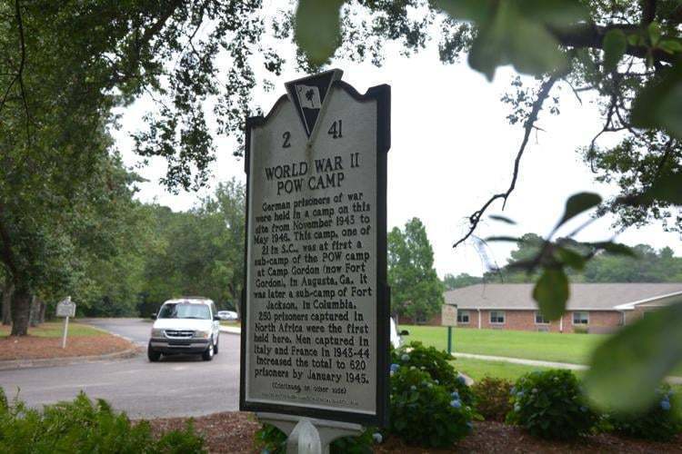 A historic marker talking about the Prisoners of War camp located at Fort Gordon.