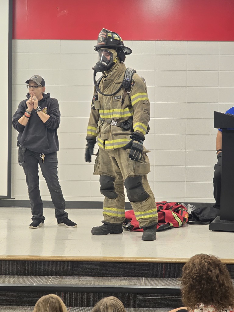 Firefighter dressed in uniform.