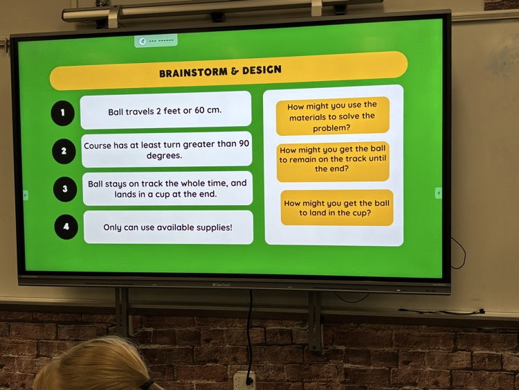 picture of a slide showing on a screen 