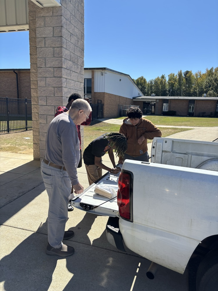 student working on race car project 