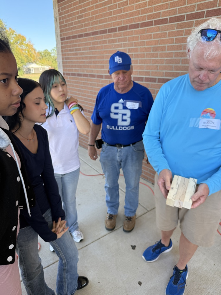 student working on race car project 