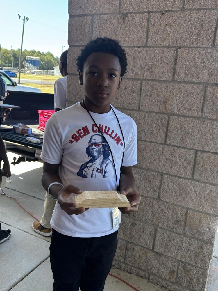 student working on race car project 