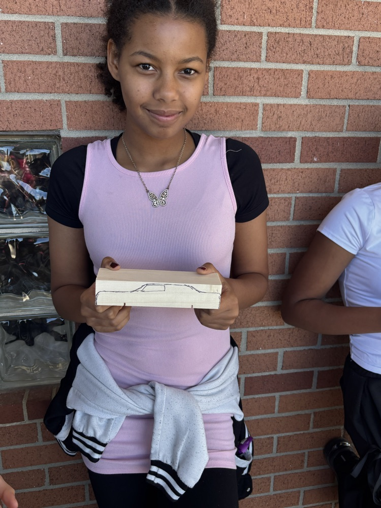 student working on race car project 