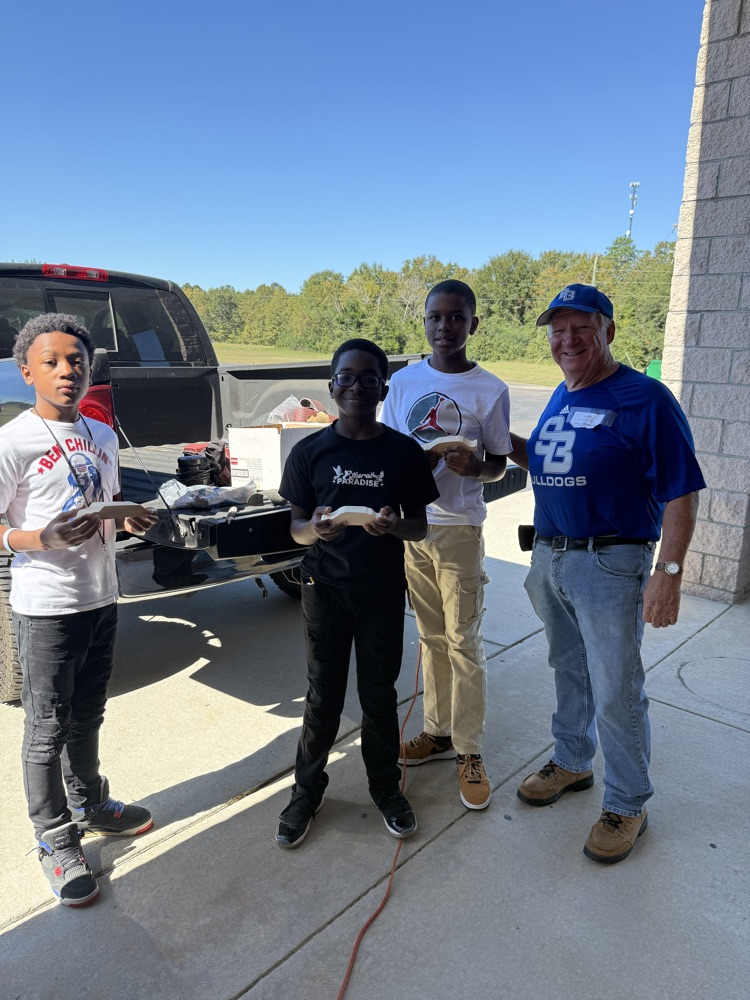 student working on race car project 