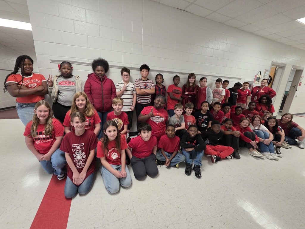 Staff and students wearing red.