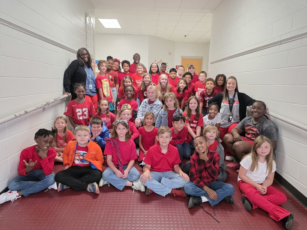 Staff and students wearing red.