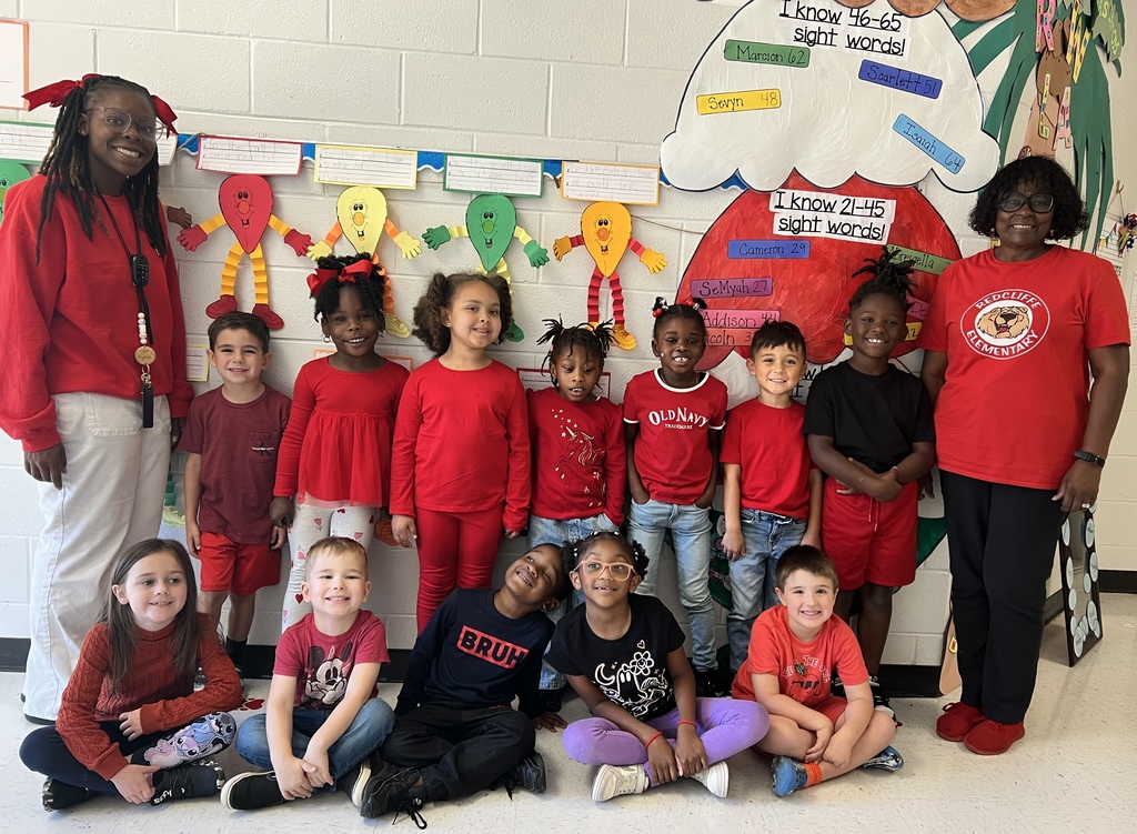 Staff and students wearing red.