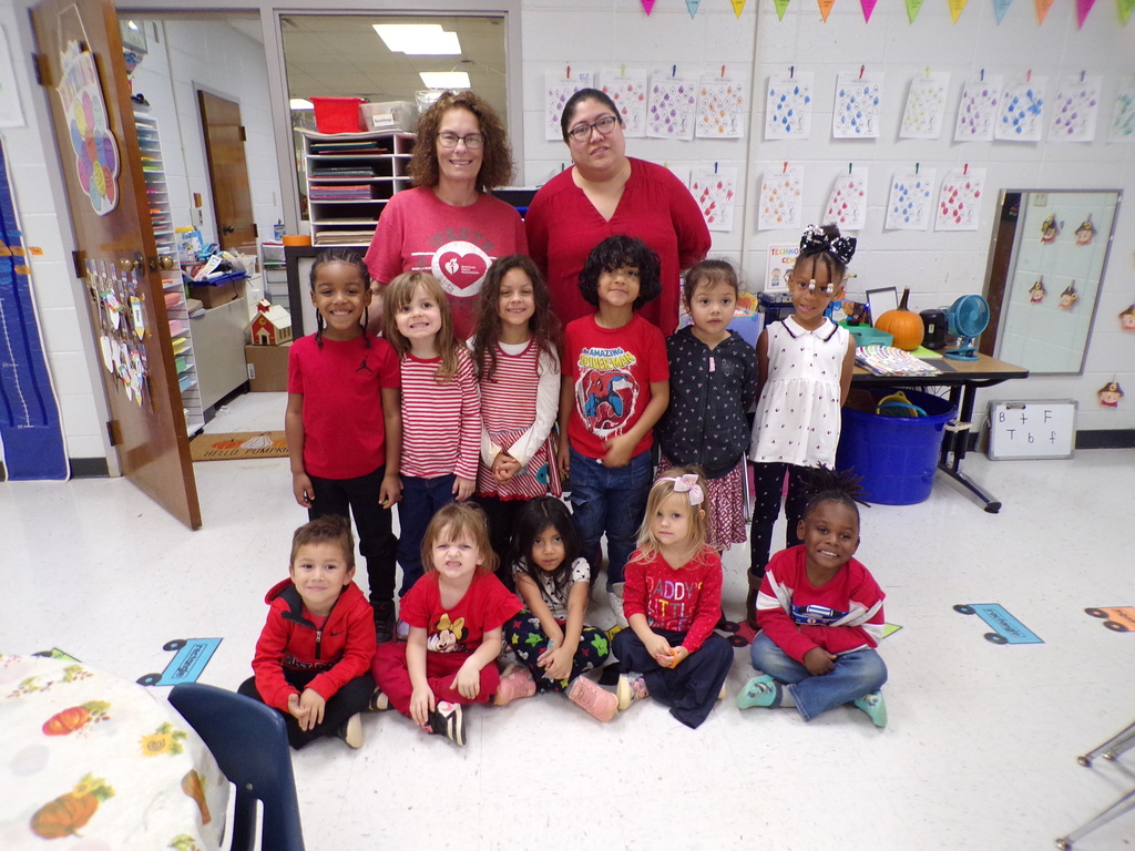 Staff and students wearing red.