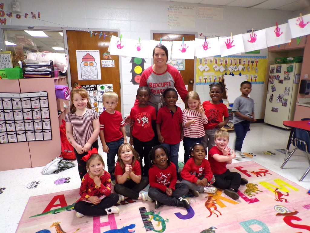 Staff and students wearing red.