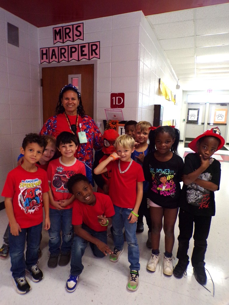 Staff and students wearing red.