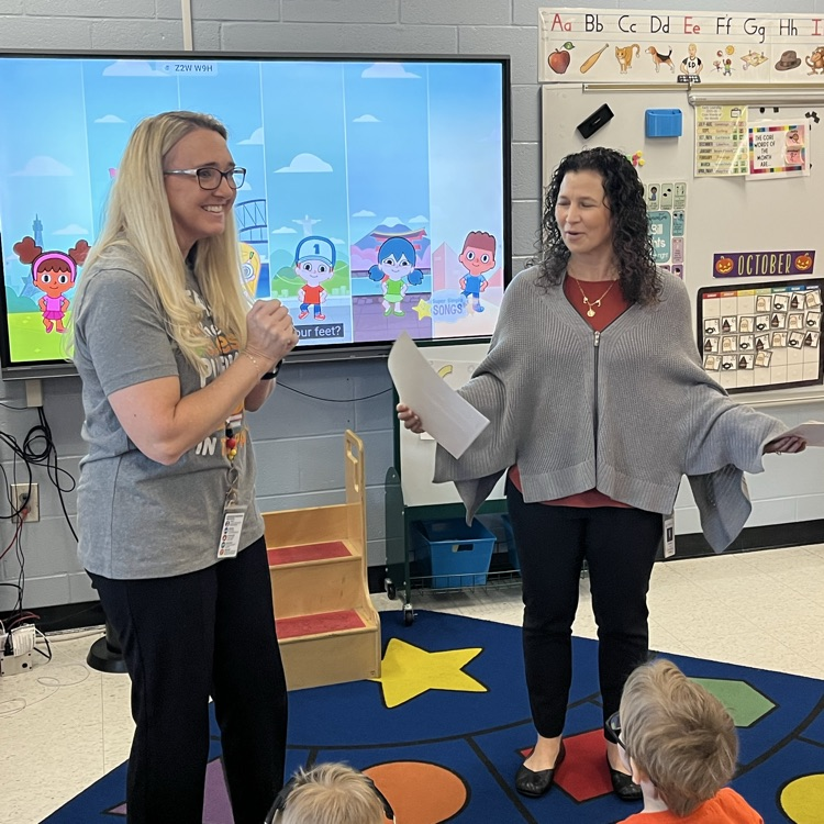 teacher accepting an award