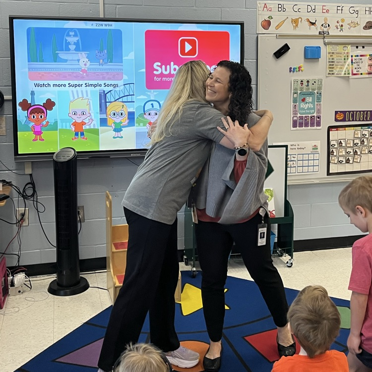 teacher accepting an award