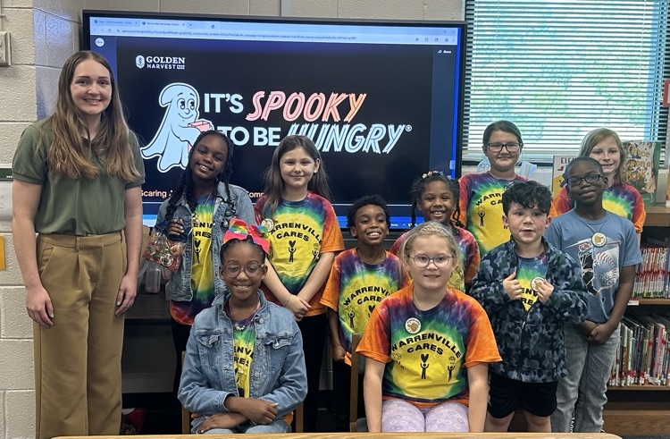 Group photo of Warrenville Cares Club with Nora Ruotolo