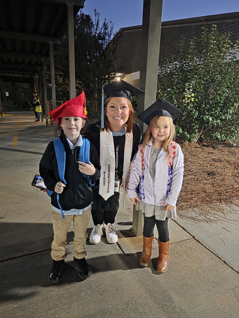 Students and staff dressd in college gear.