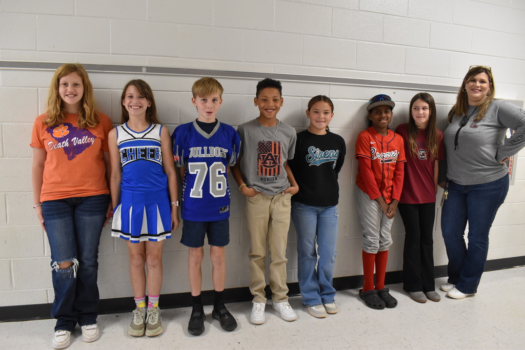 Students dressd in college gear.