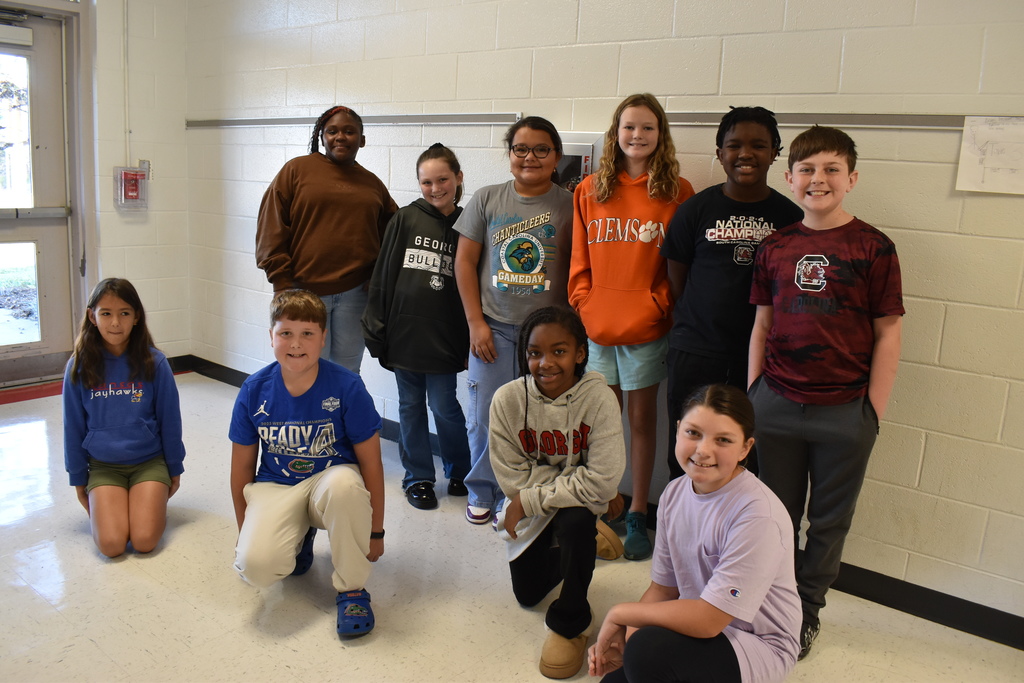 Students dressd in college gear.