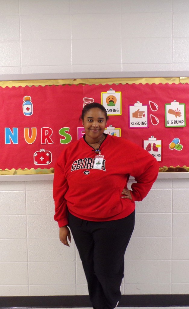 Staff dressd in college gear.