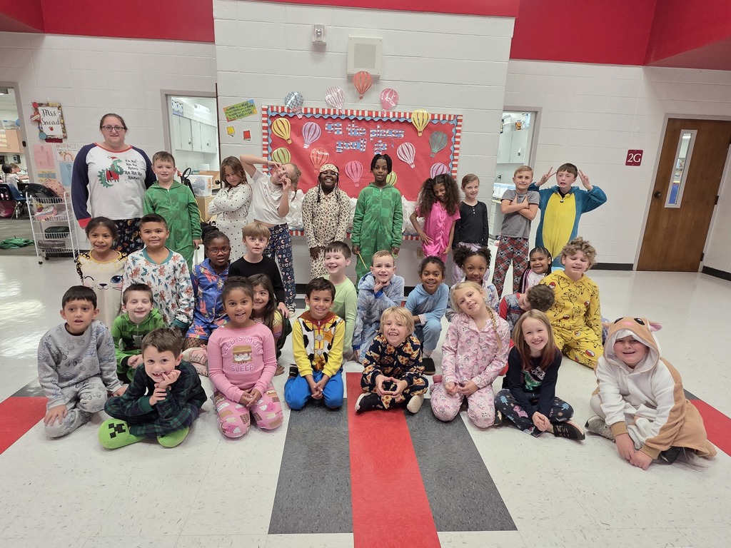 Students and staff wearing pajamas.