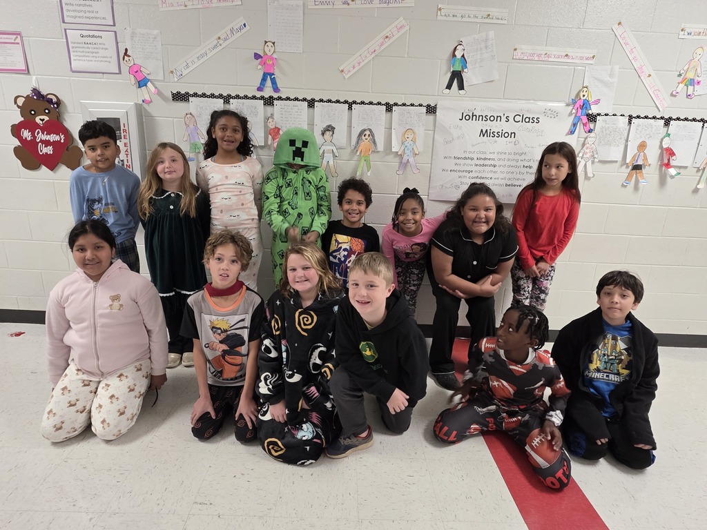 Students and staff wearing pajamas.