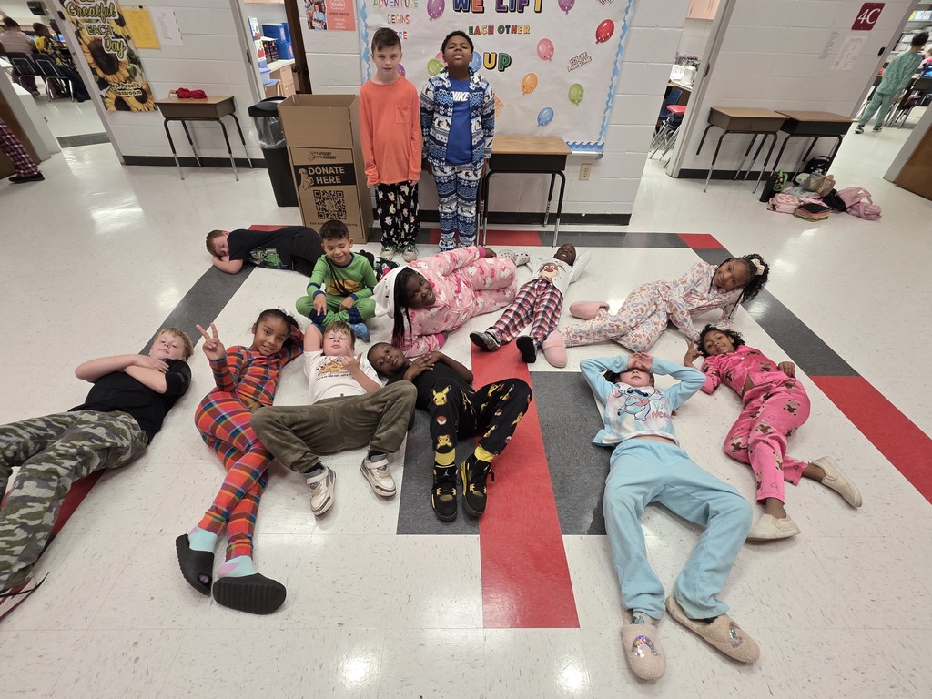 Students and staff wearing pajamas.