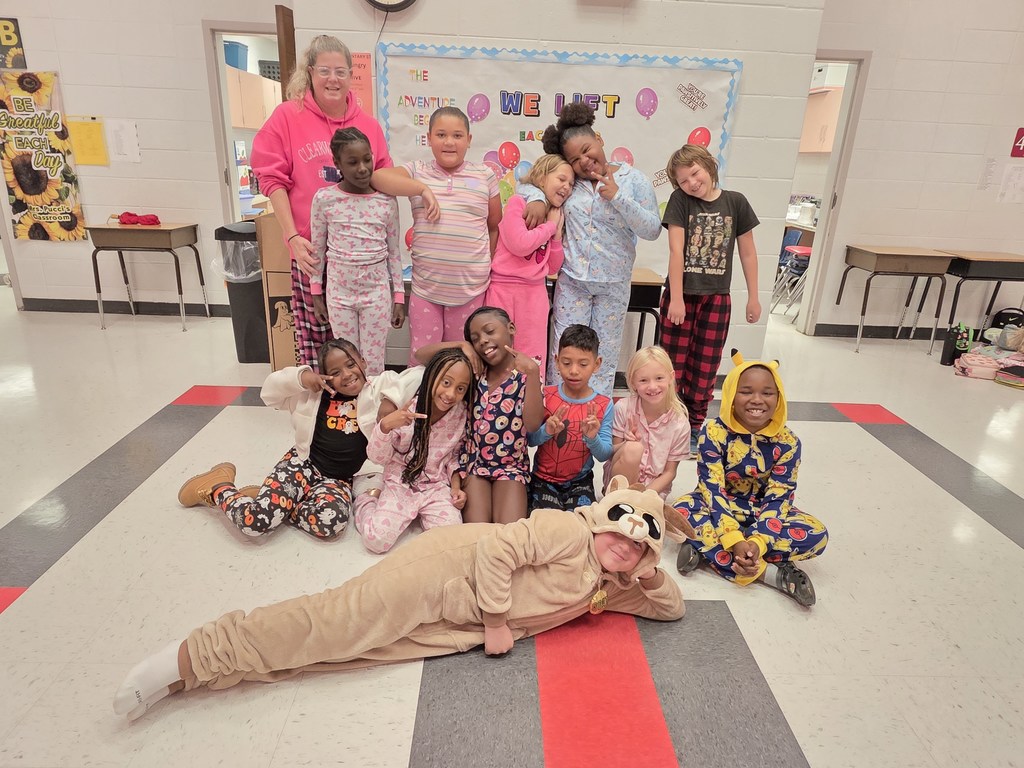 Students and staff wearing pajamas.