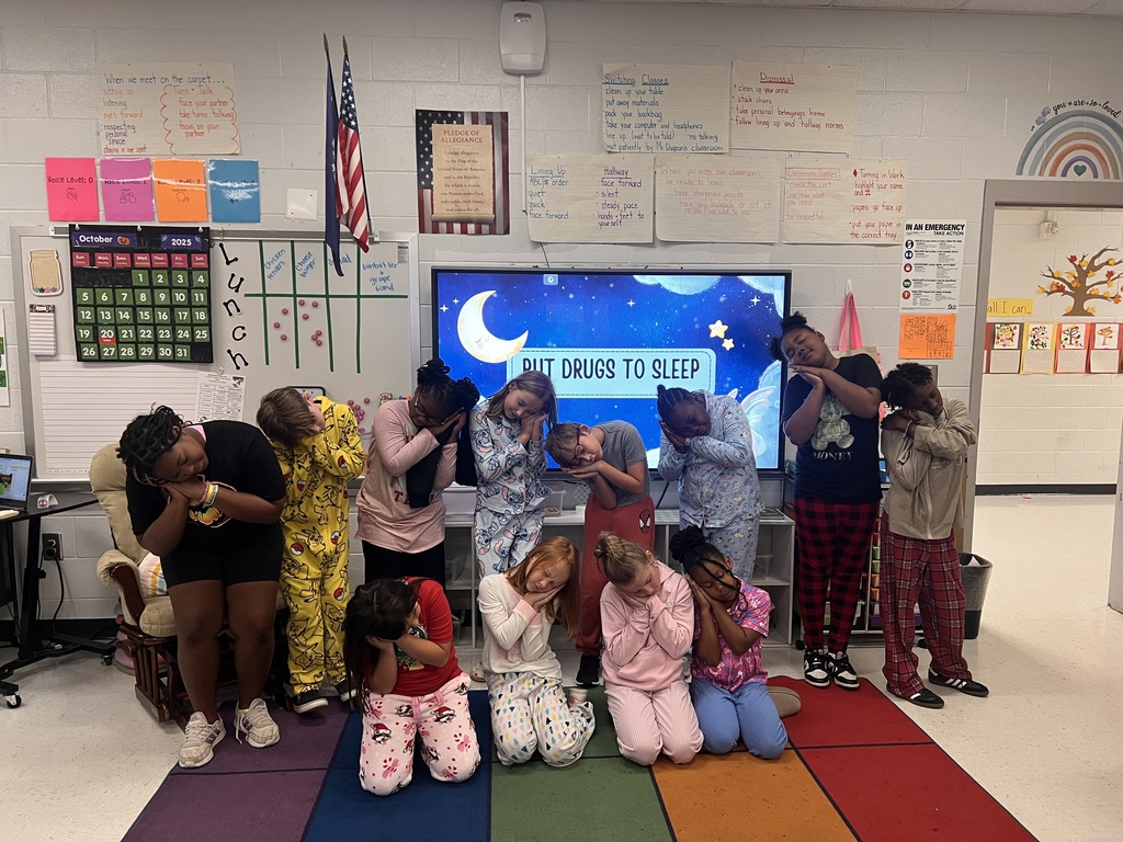 Students and staff wearing pajamas.
