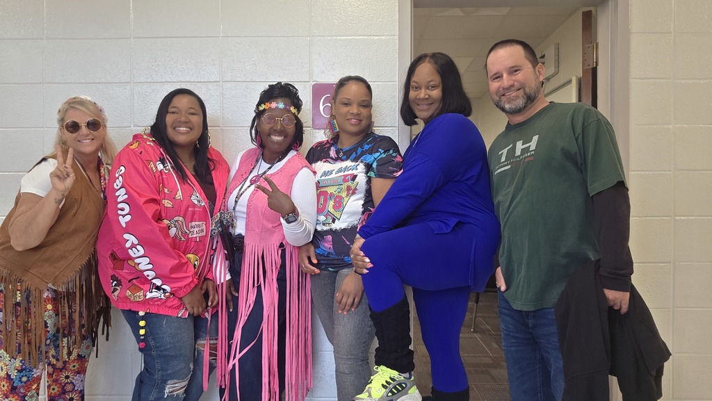 Staff dressed from various decades.