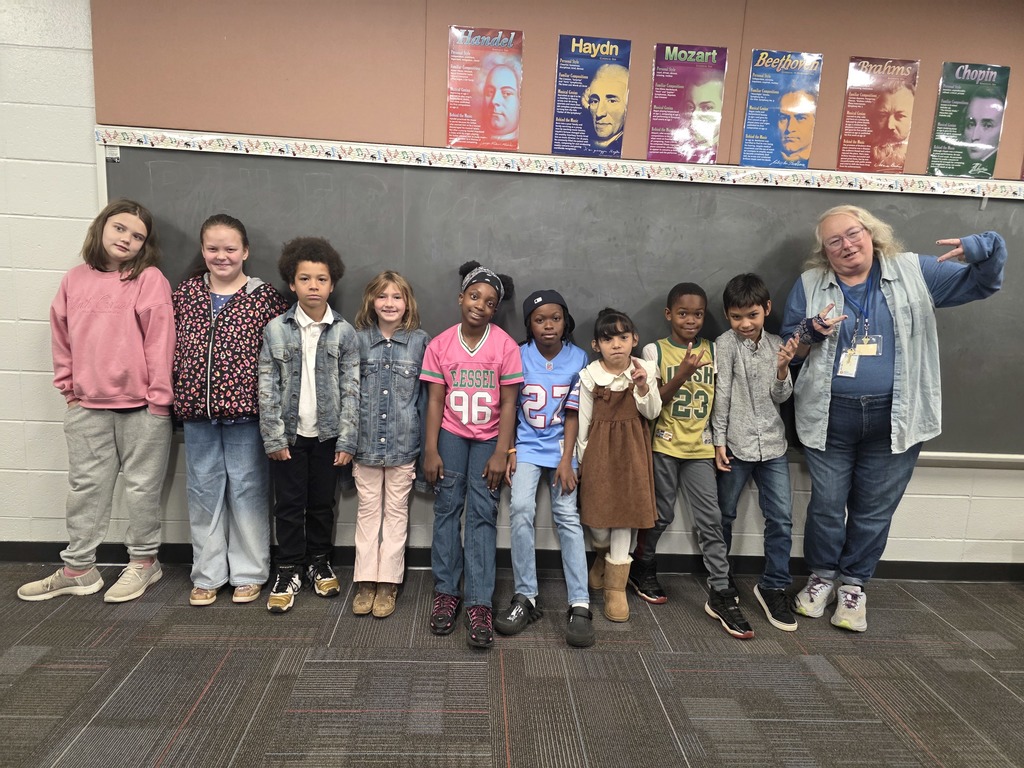 Students and staff dressed from various decades.