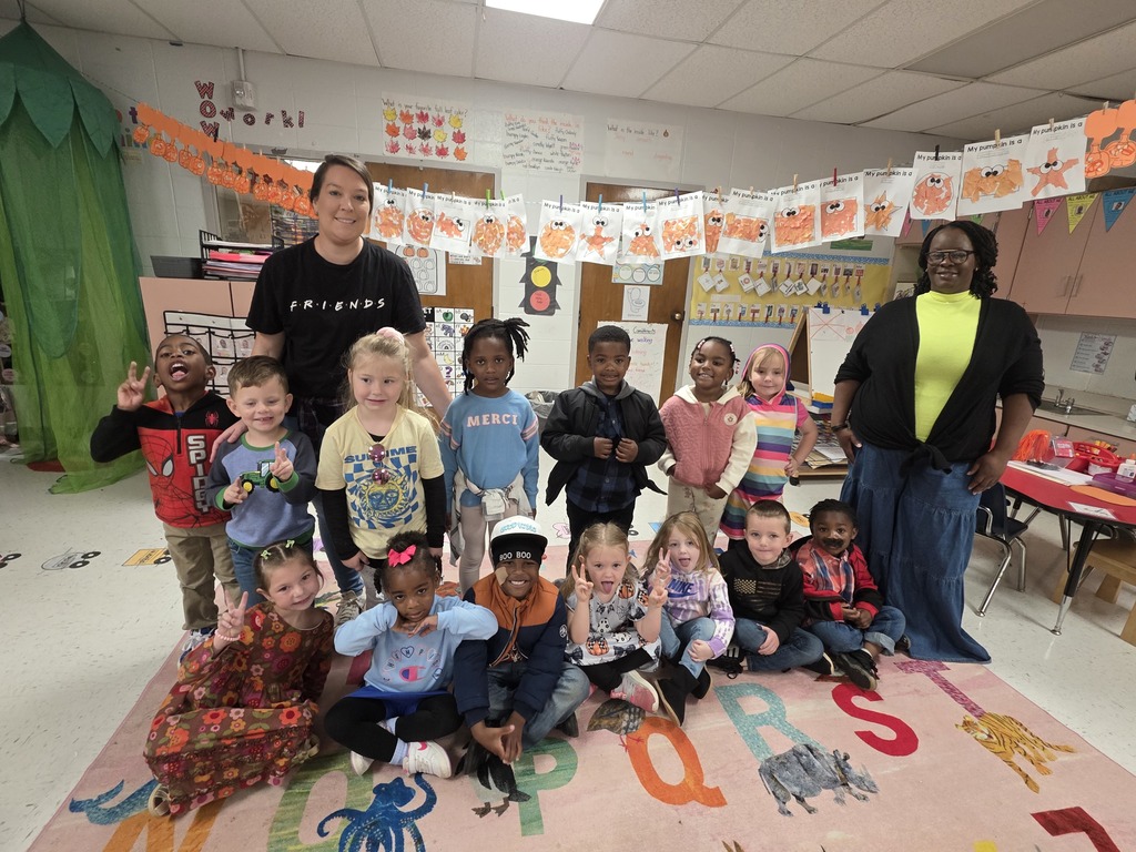 Students and staff dressed from various decades.