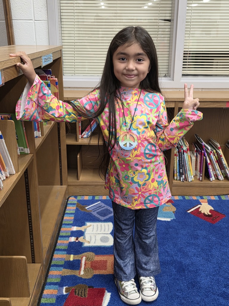 Student dressed from 60s decade.