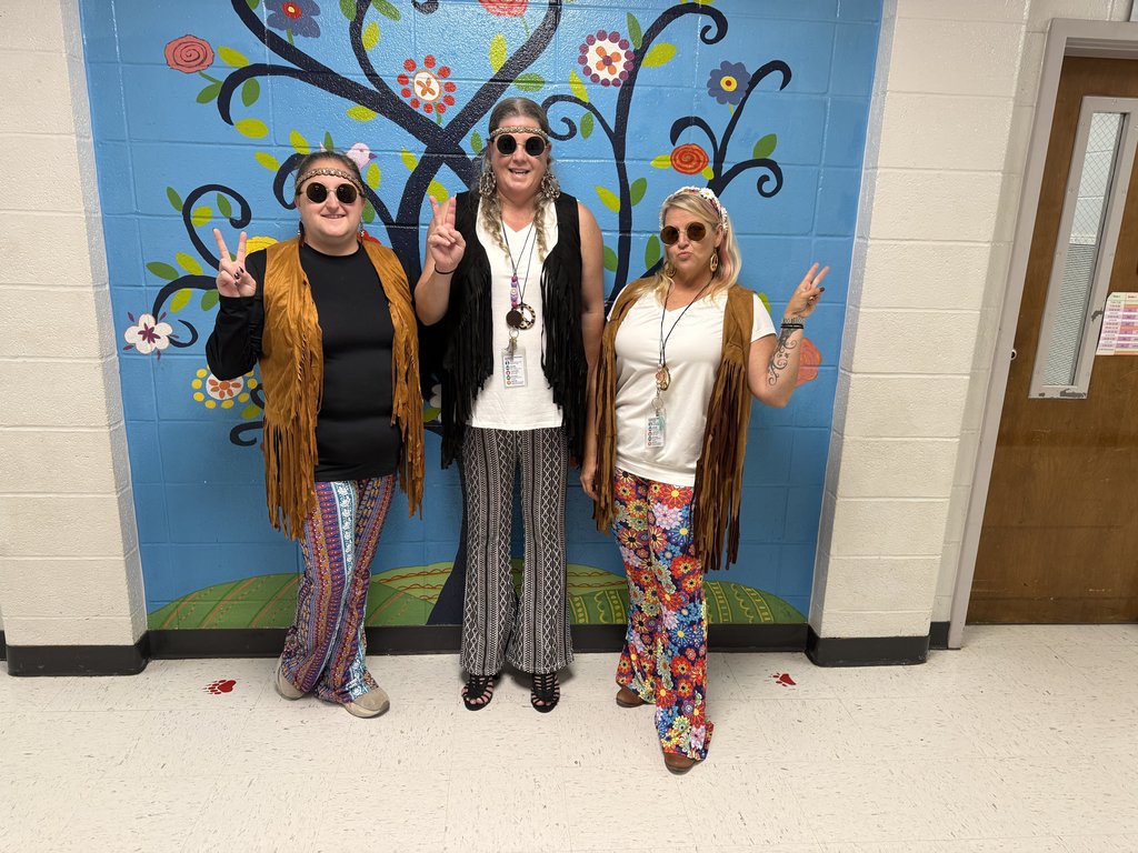 Staff dressed from 60s decade.