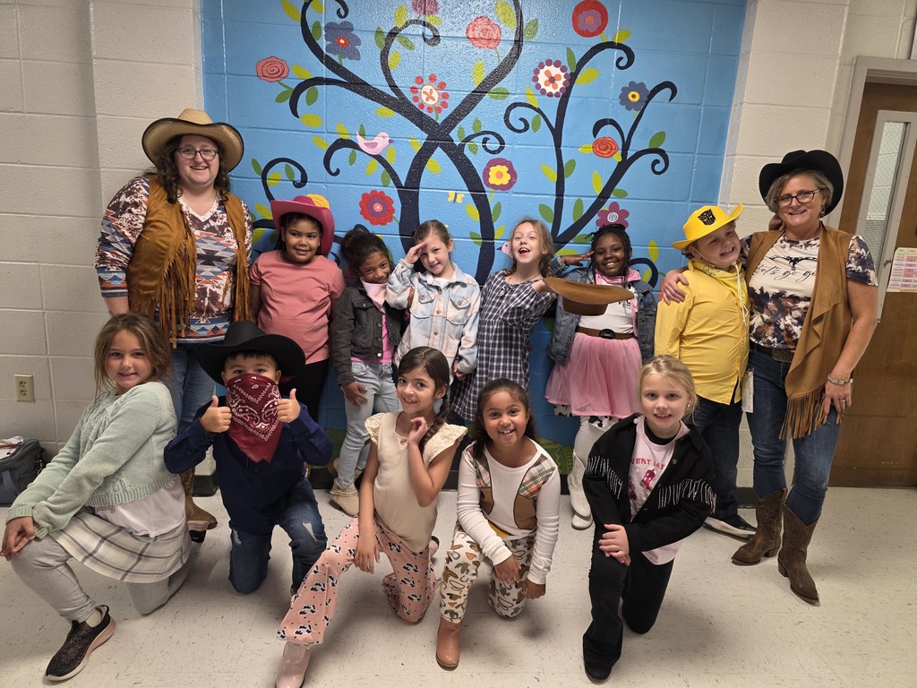 Students and staff dressed in western outfits.