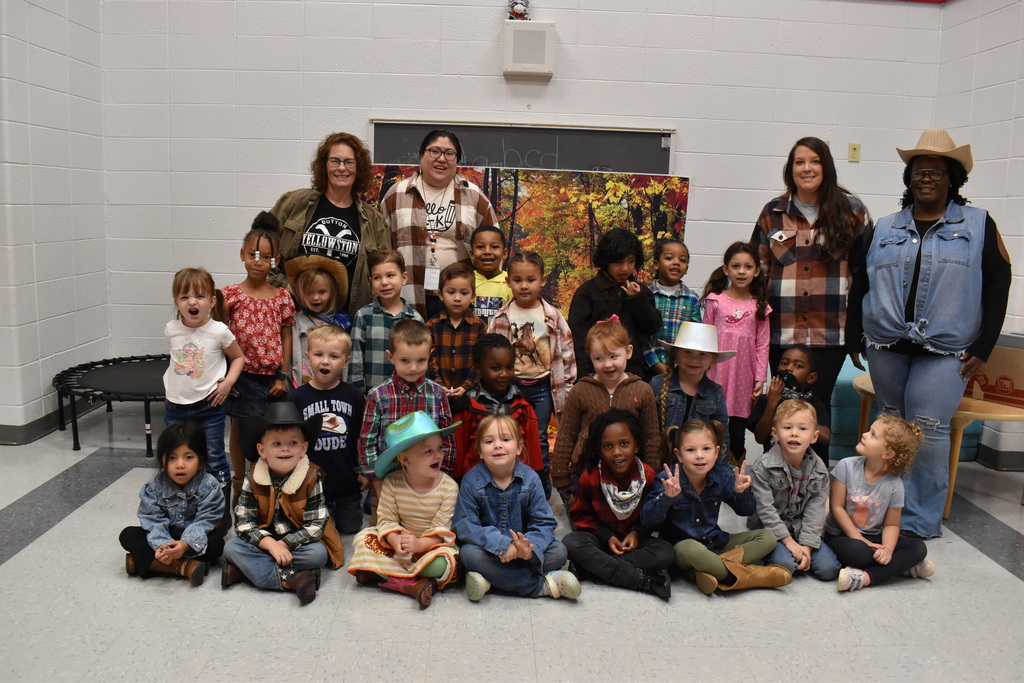 Students and staff dressed in western outfits.