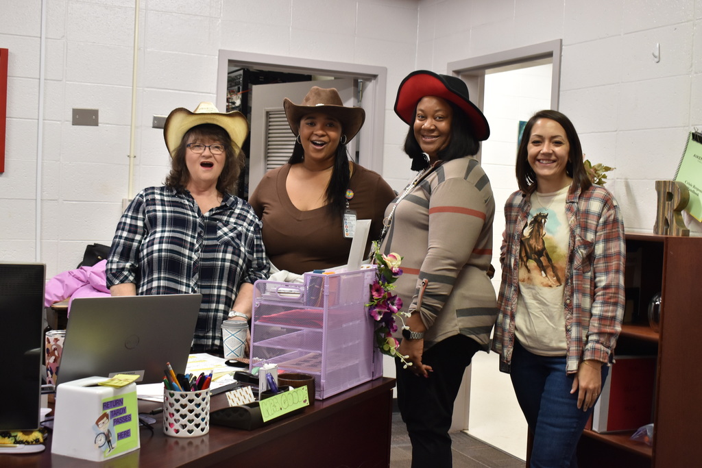 Staff dressed in western outfits.