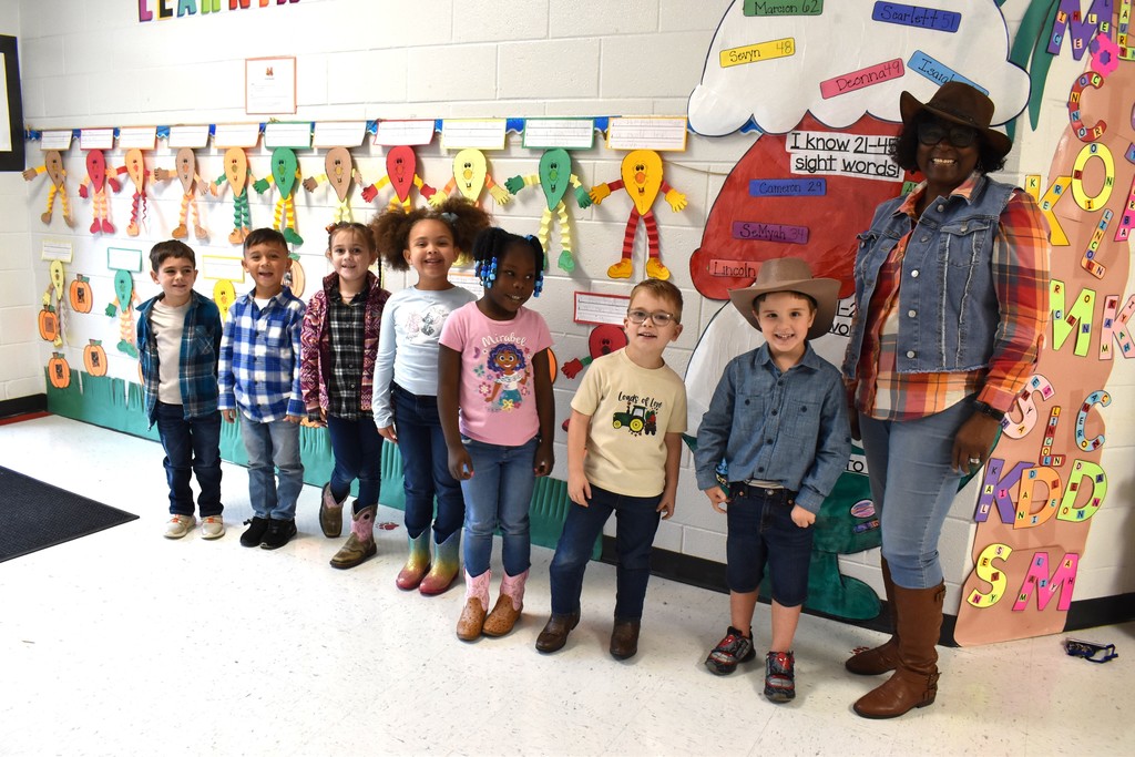 Students and staff dressed in western outfits.
