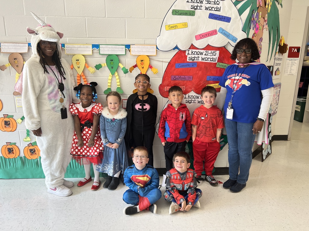 Students and staff dressed as superheroes.