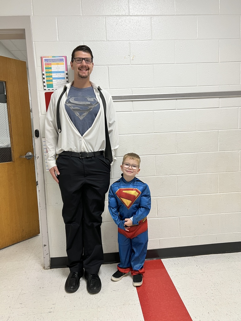 Student and staff dressed as superheroes.