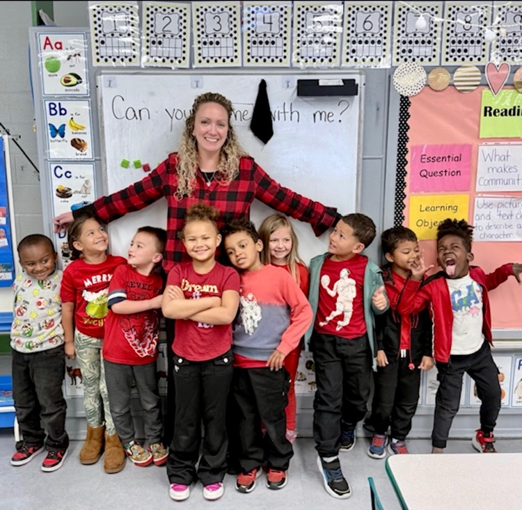 Ms. Lagrow and her students wearing red for red ribbon week 