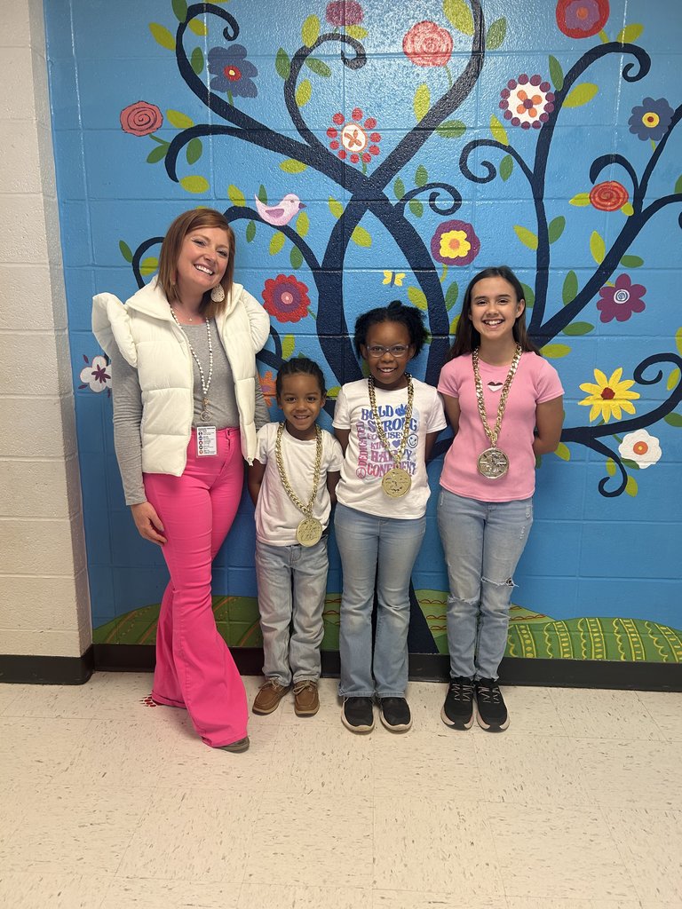 Fund raiser top sellers standing with principal.