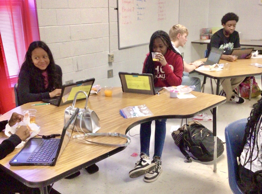 Girls enjoying breakfast.